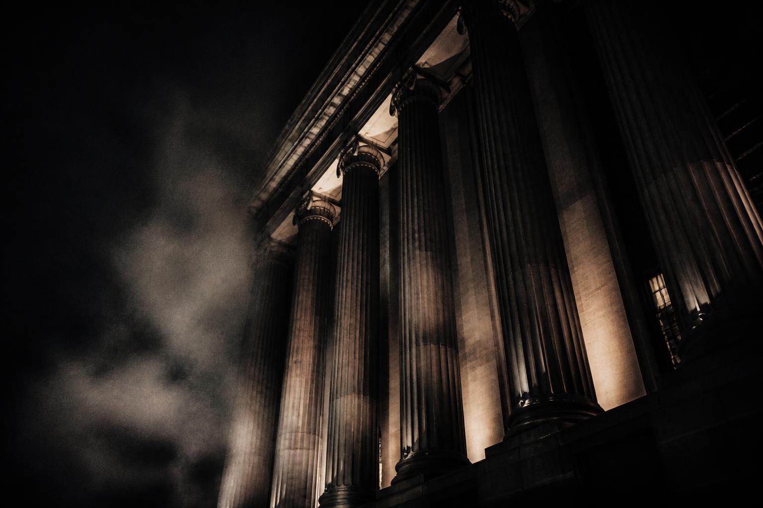 Art deco courthouse columns at night
